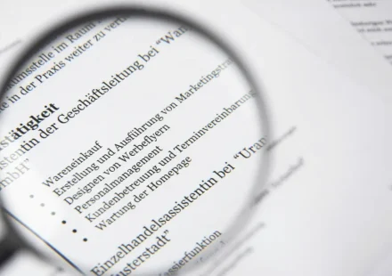 magnifying glass over printed text