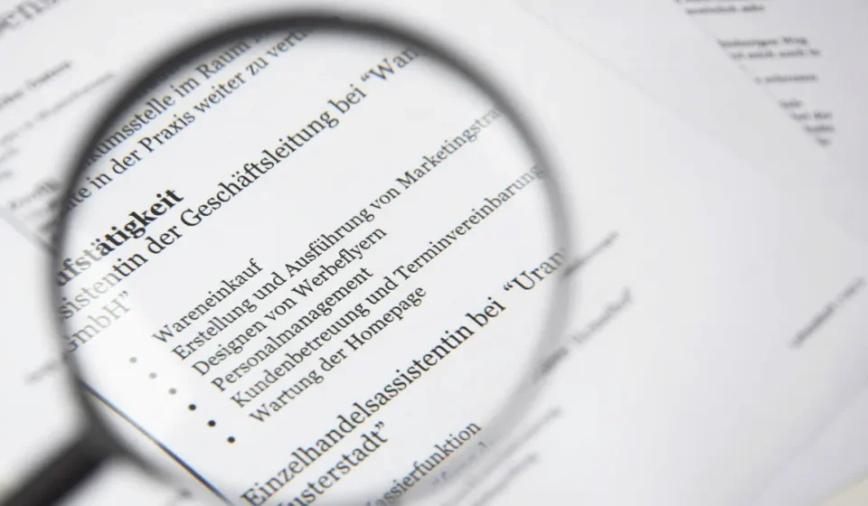 magnifying glass over printed text