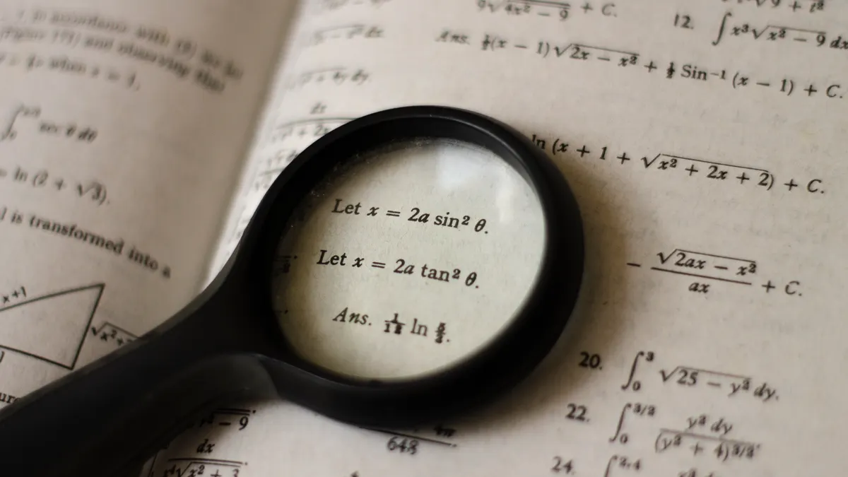 AI SEO tools for SERP analysis: what to look for in competing pages before you write magnifying glass over a textbook page