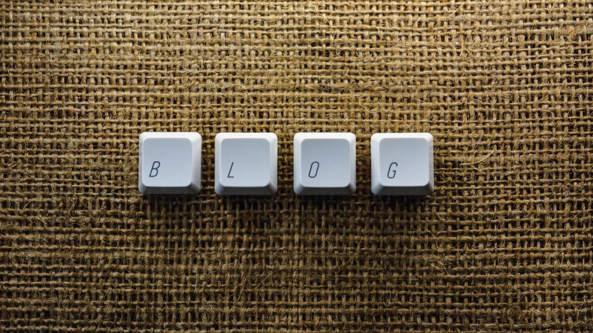 Ai Writing Business Ai Writing Business — Close-up of Individual Keyboard Keys Making a Word "Blog"