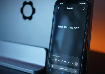 Smartphone with ChatGPT open on screen