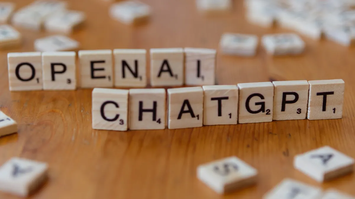 ChatGPT prompts for niche blogs ChatGPT prompts for niche blogs — AI Terminology in Letter Tiles on Wooden Desk