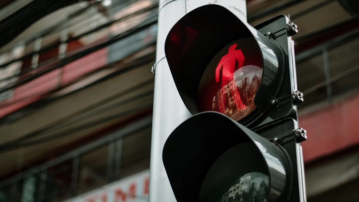 How to build an approval process for AI-assisted SEO content Traffic light on a street pole